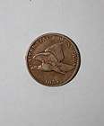 1857 FLYING EAGLE PENNY IN PROTECTIVE PLASTIC CAPSULE  