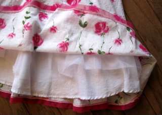 This listingis for a beautiful pink and white eyelet dress by Pinky 