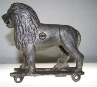 antique cast iron toy bank circus lion wheels vintage silver pt barnum 