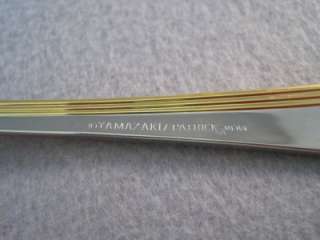  dinner forks in the Ramona Gold pattern by Yamazaki. 7 1/2 inches