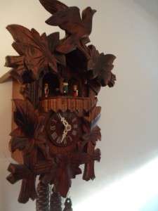   CLOCK WITH SWISS MUSICAL TWIN TUNES MOVEMENT IN GOOD WORKING ORDER