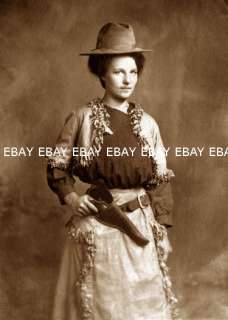 PHOTO OF A WESTERN COWGIRL WITH PISTOL HOLSTER & HAT  