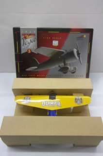 TRAVEL AIR OLYMPIA 1/32 DIE CAST AIRPLANE COIN BANK  