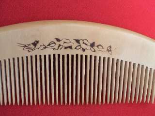 POINTY FINE TOOTHED WOOD COMB w/PAINTED FLOWERS   5.35  