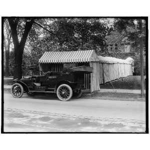  Packard automobile,tented entrance to club or dwelling 