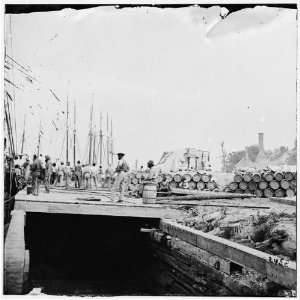   War Reprint City Point, Virginia. Army stores on wharf