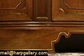 Elegant and graceful, a demilune or half round console cabinet was 