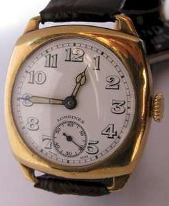 Longines solide yellow Gold 9 k, cussion case size 31 mm wire lugs 
