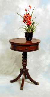  pedestal end table featuring one felt lined drawer brass cap feet 