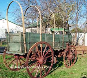 chuck wagon horse drawn farm wooden wheels stagecoach  