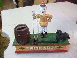 Rare Trick Dog Cast Iron Bank Works Great  