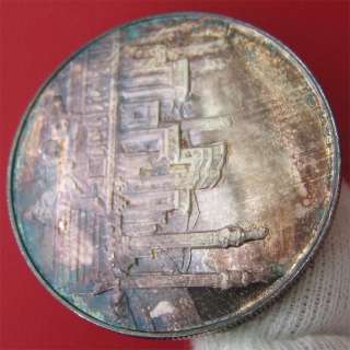 toning with blue green hues on both sides of the coin 2500th 