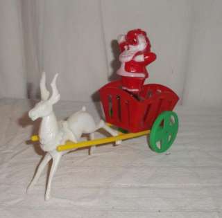   ROSEN WHEELED CHRISTMAS CANDY CONTAINER STANDING SANTA IN CART  