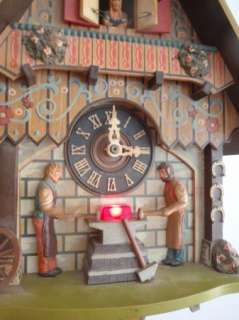 The clock is a beautiful, colorful chalet. It works well and keeps 