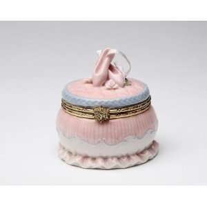  Pair of Pink Ballerina Shoes on Round Shape Box Container 
