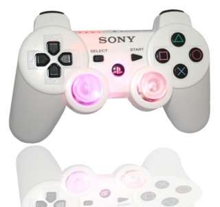 This is a White PS3 controller Modded with Clear Joystick Thumbsticks 