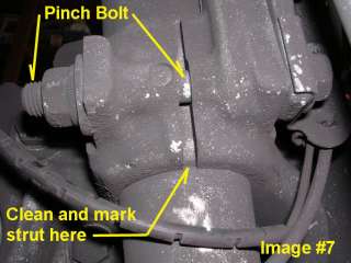 The large bolt you will eventually remove to drop the bushing side of 