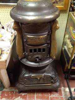   Round Oak Cast Iron Parlor Wood Stove made by P.D.Beckwith Dowagic Mi